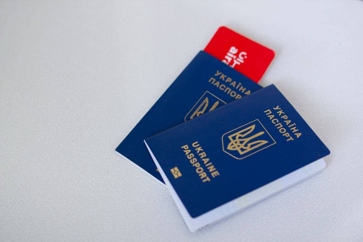 Close-up of passports and travel documents on a desk
